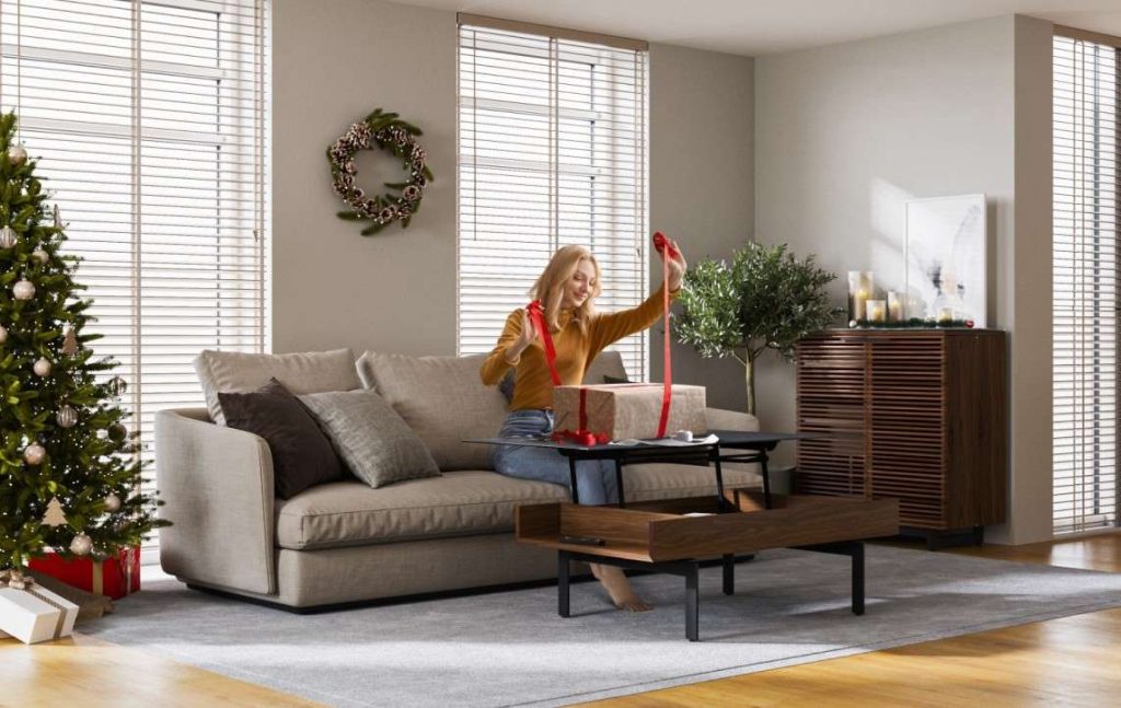 Woman wrapping gifts at BDI Reveal coffee table